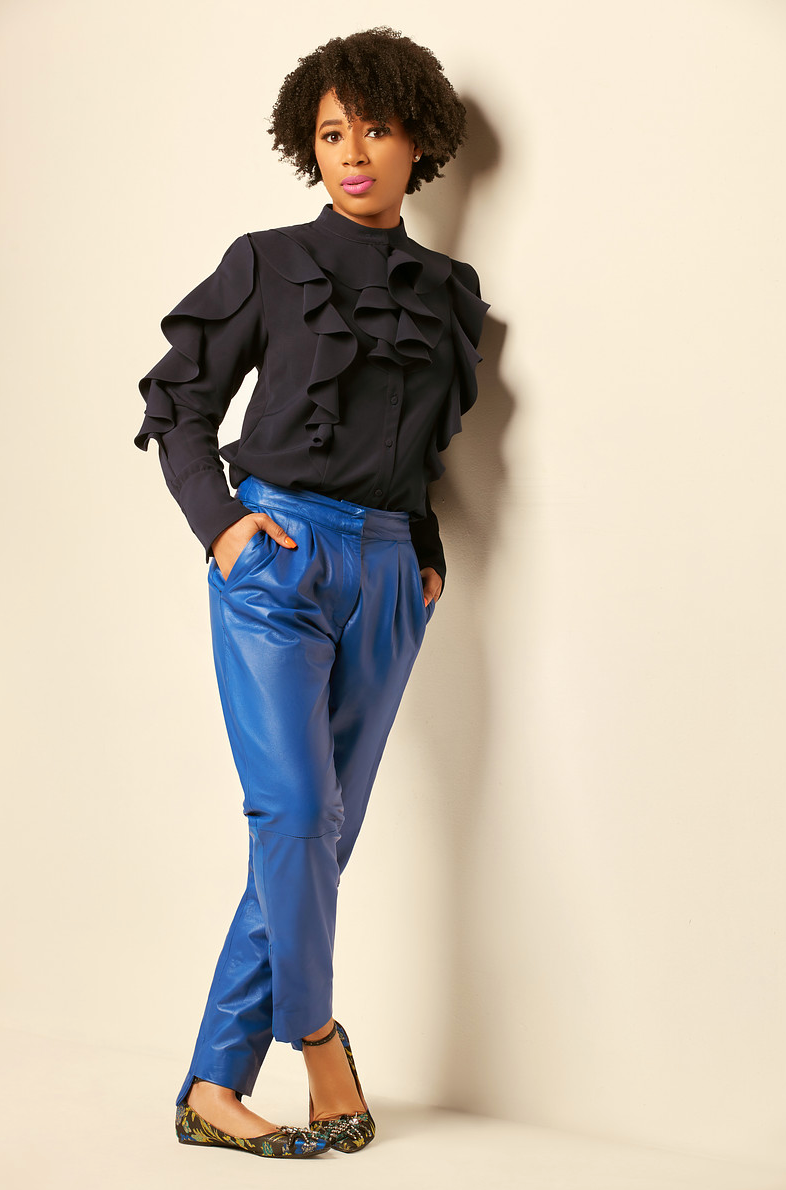 woman wearing blue SESS RAY leather pants